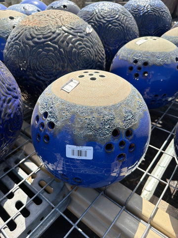 Sphere with Petal Holes